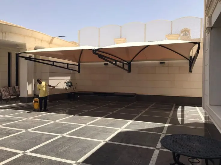 تركيب مظلات سيارات قماشية في حي الملقا بالرياض